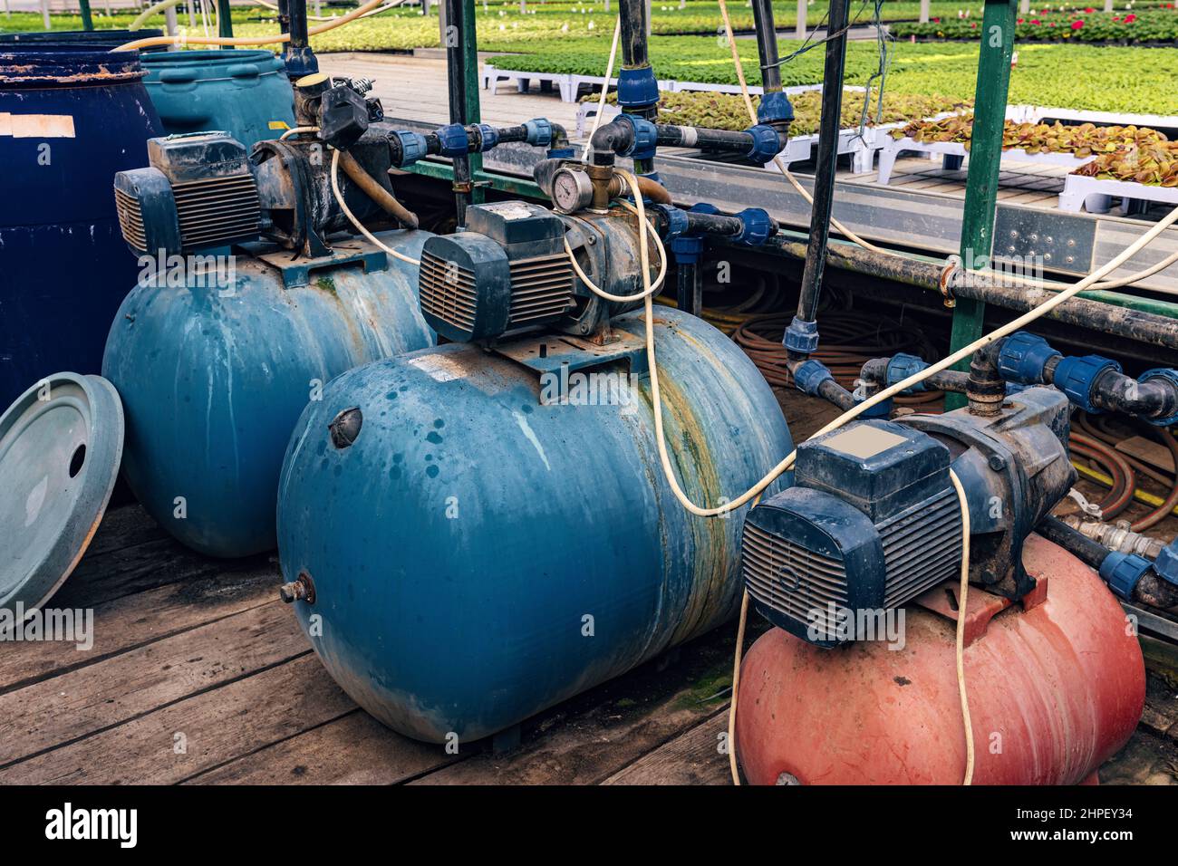 Closeup water pump for greenhouse. Electric motor water pump Stock