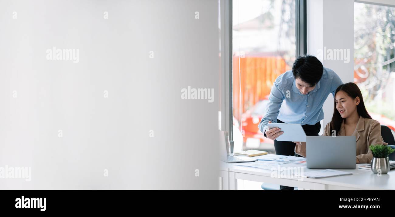 Business Asian People Analyzing Statistics Business Documents, Financial Concept Stock Photo