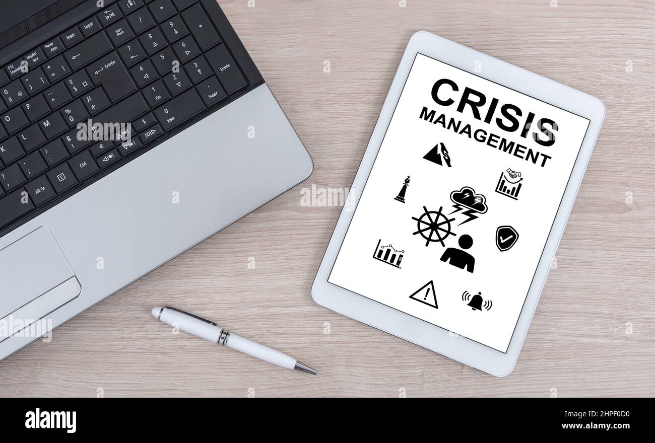 Crisis management concept shown on a digital tablet Stock Photo