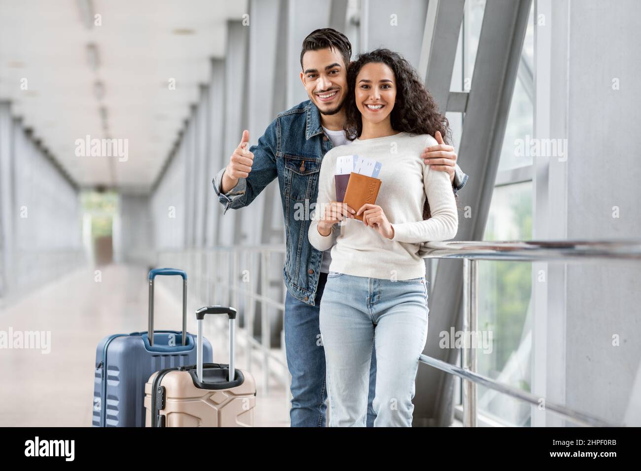 Travel Advertisement. Happy Young Arab Couple Posing At Airport Stock ...