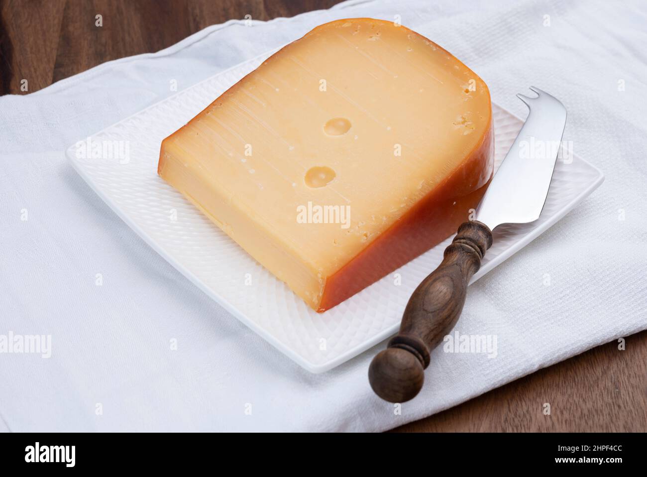 Dutch hard cow milk old yellow cheese from Gouda Stock Photo Alamy