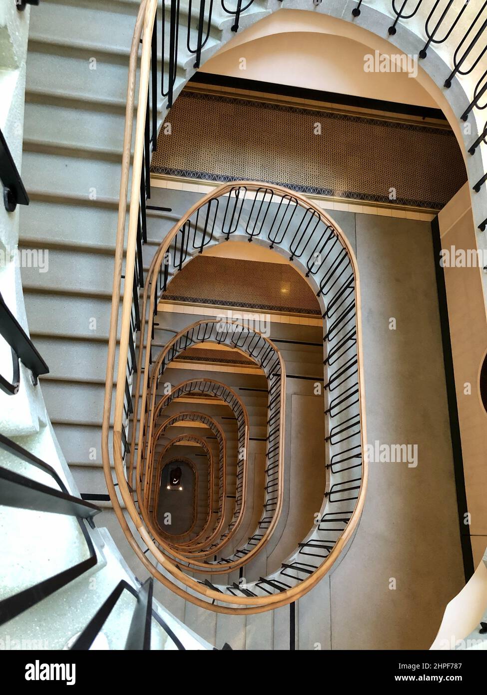 Spiral hotel staircase from above, Vienna Stock Photo - Alamy - Curved Spiral Staircase Design Elements In Hotels