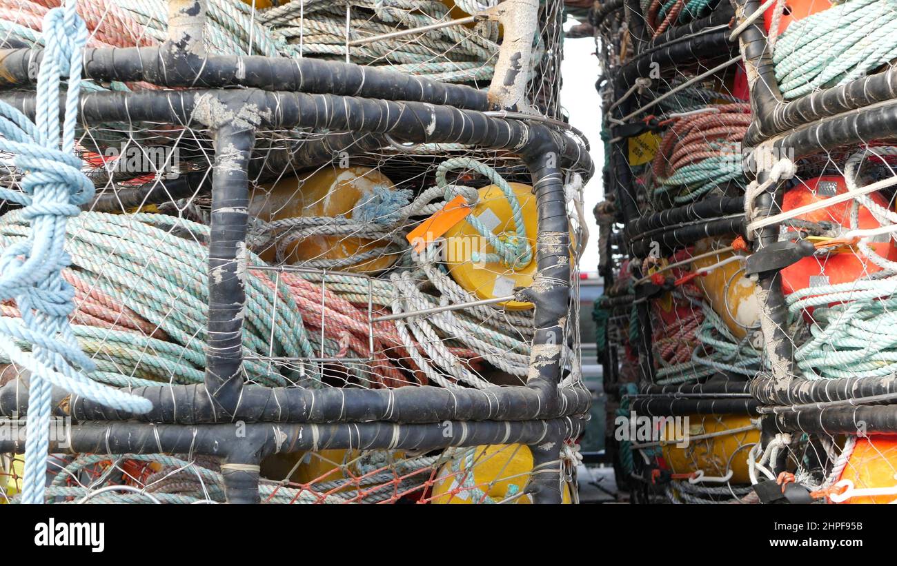 Lobster pots cages traps net netting hi-res stock photography and ...