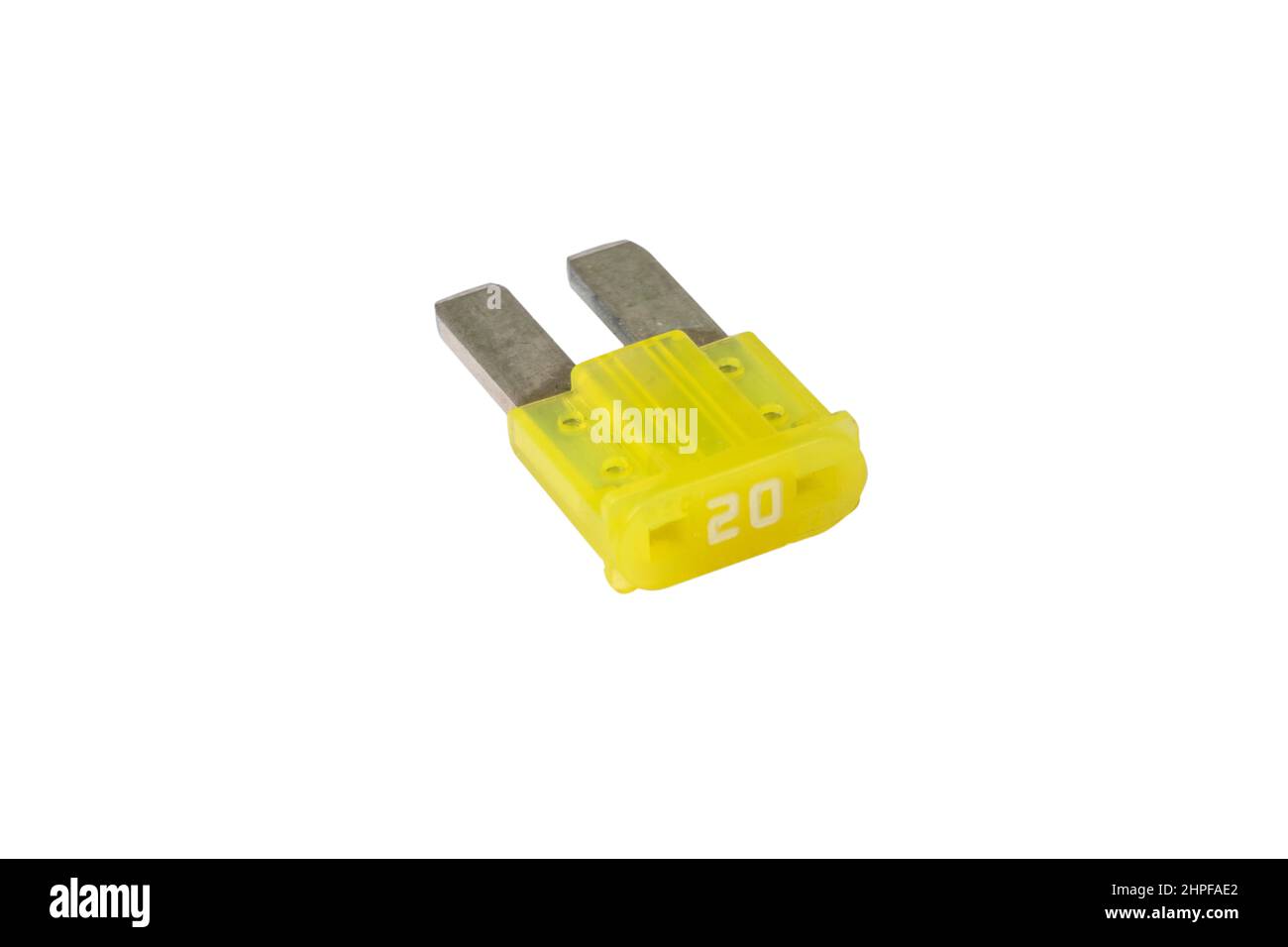 Macro photography of a car fuse isolated on white background. Car fuse isolated.  Protection electric system of a car Stock Photo