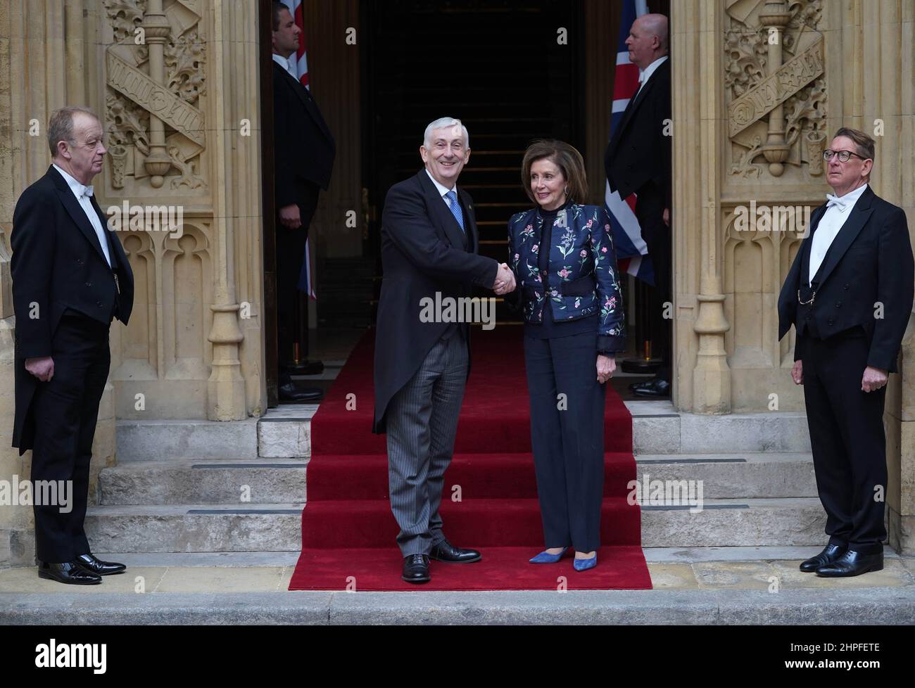 Nancy Pelosi, Speaker of the House of Representatives, with Commons Speaker Sir Lindsay Hoyle, during a visit as his guest to the Houses of Parliament in Westminster, London. Picture date: Monday February 21, 2022. Stock Photo
