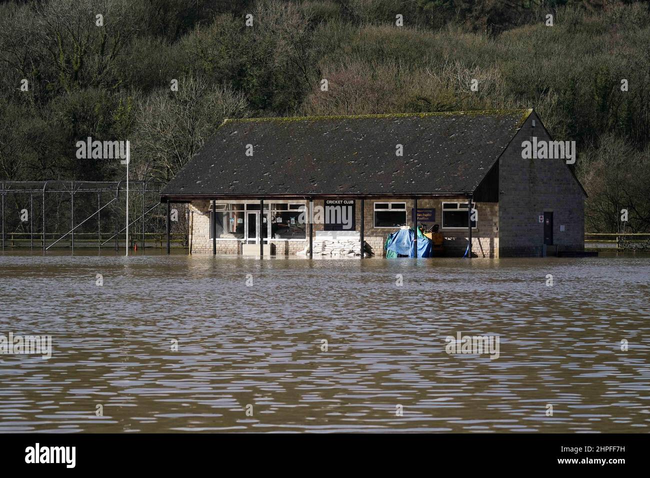 Ambergate Cricket Club is flooded in Belper, Derbyshire, as Britons have been warned to brace for strengthening winds and lashing rain as Storm Franklin moved in overnight, just days after Storm Eunice destroyed buildings and left 1.4 million homes without power. Picture date: Monday February 21, 2022. Stock Photo