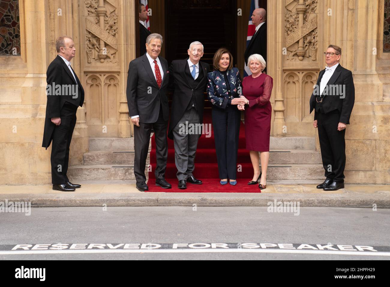 Nancy Pelosi, Speaker of the House of Representatives (third from left) and her husband, Paul Pelosi (far left) are greeted by Commons Speaker Sir Lindsay Hoyle (second from left) and his wife Catherine Swindley (far right) during a visit as their guests to the Houses of Parliament in Westminster, London. Picture date: Monday February 21, 2022. Stock Photo