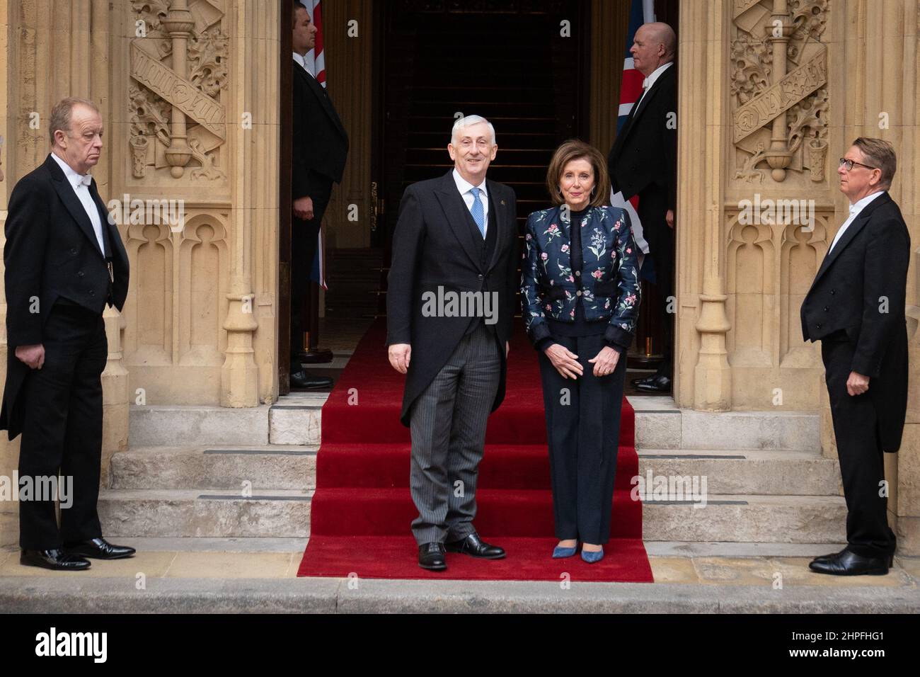 Nancy Pelosi, Speaker of the House of Representatives, is greeted by Commons Speaker Sir Lindsay Hoyle, during a visit as his guest to the Houses of Parliament in Westminster, London. Picture date: Monday February 21, 2022. Stock Photo