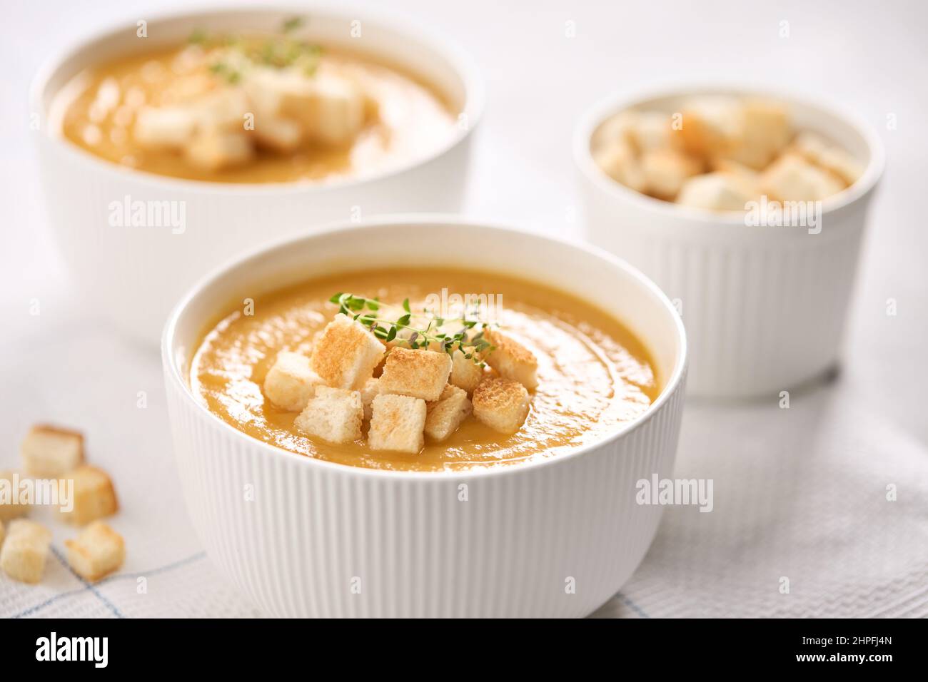 Pumpkin soup puree with croutons. Close-up. Vegetable soup. Stock Photo