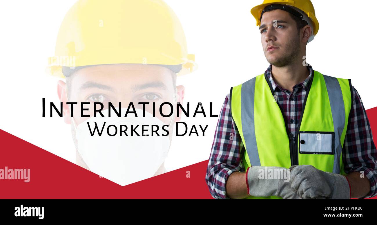 Young male caucasian building contactor wearing reflective clothes by international workers day text Stock Photo