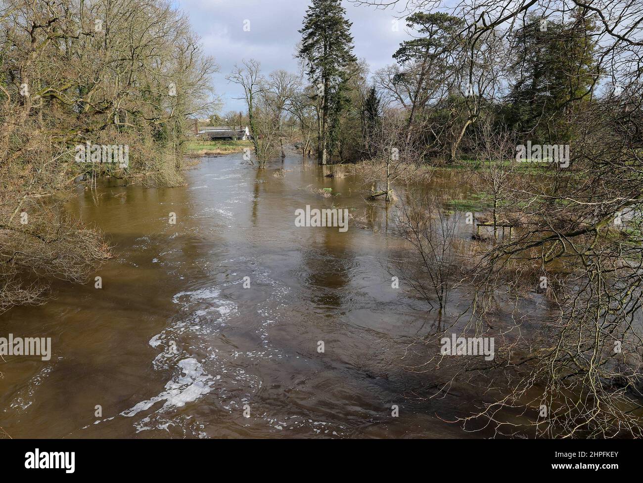 Magheralin, County Down, Northern ireland, UK. 21 Feb 2022. UK weather – after heavy overnight wind and rain from Storm Franklin there was flooding in many areas across Northern Ireland. Near Magheralin the River Lagan burst its banks to flood fields and surrounding agricultural land. Credit: CAZIMB/Alamy Live News. Stock Photo
