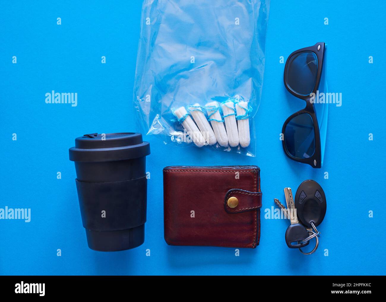 A flat lay showing lifestyle ojects with tampons Stock Photo