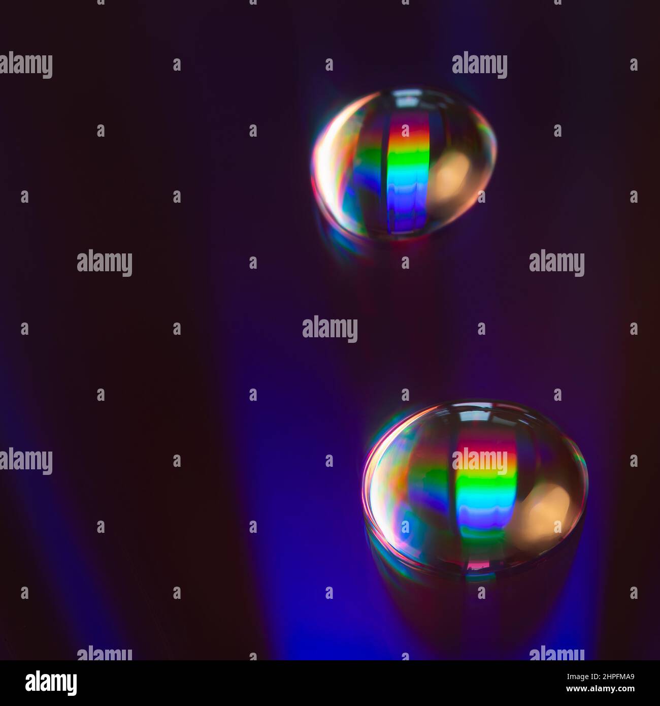 Shiny raibow colored water drops on the old compact CD disc, design for ...