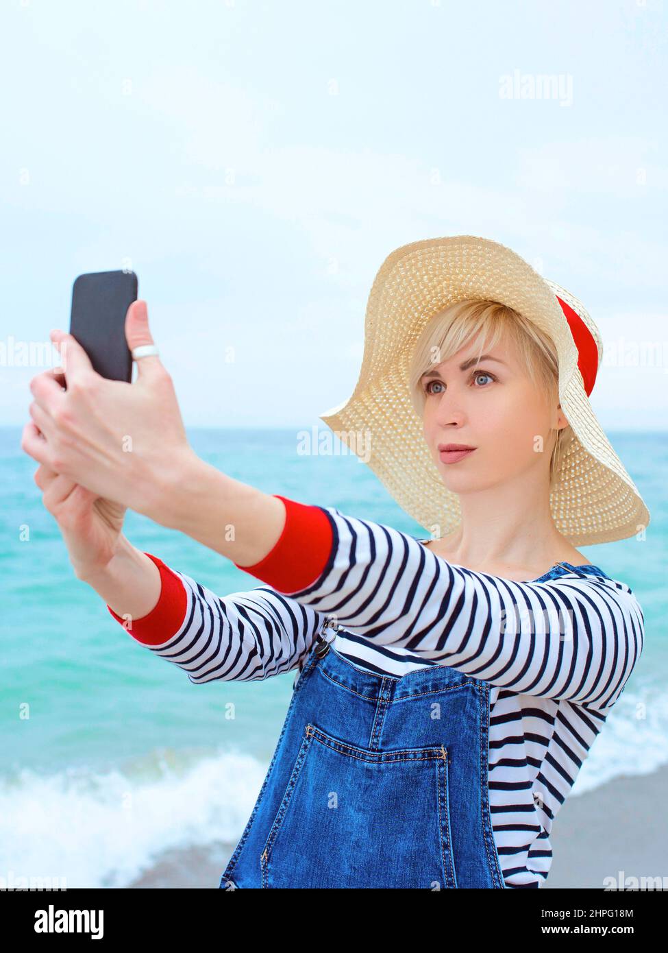Beautiful young blonde in denim hi-res stock photography and images - Alamy