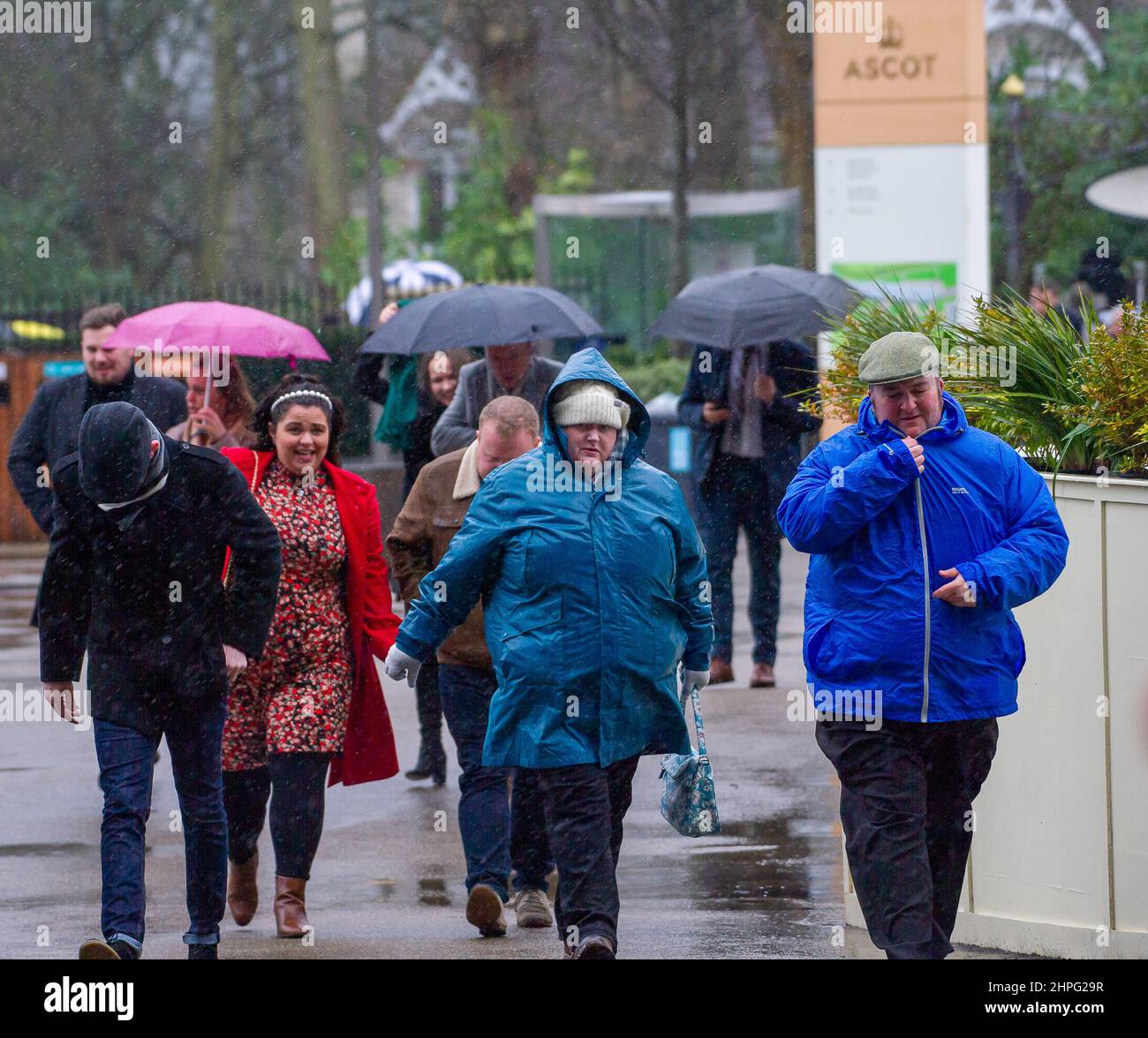 Ascot, Berkshire, UK. 19th February, 2022. Racegoers attending the ...