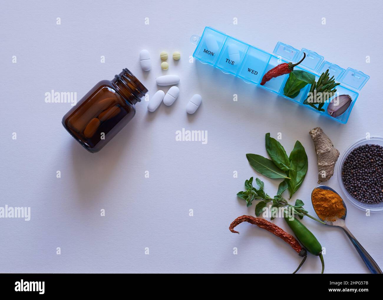 Herbal versus chemical medicine alternative remedies flat lay