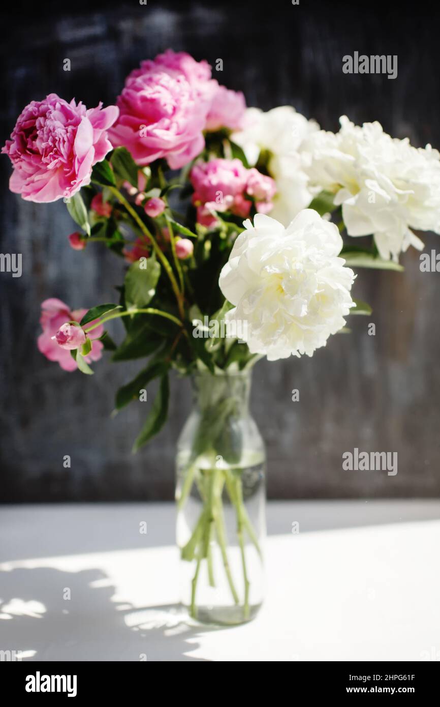 Dreamy flower bouquet of pink natural peonies flowers, spring and summer season bouquet, selective focus Stock Photo