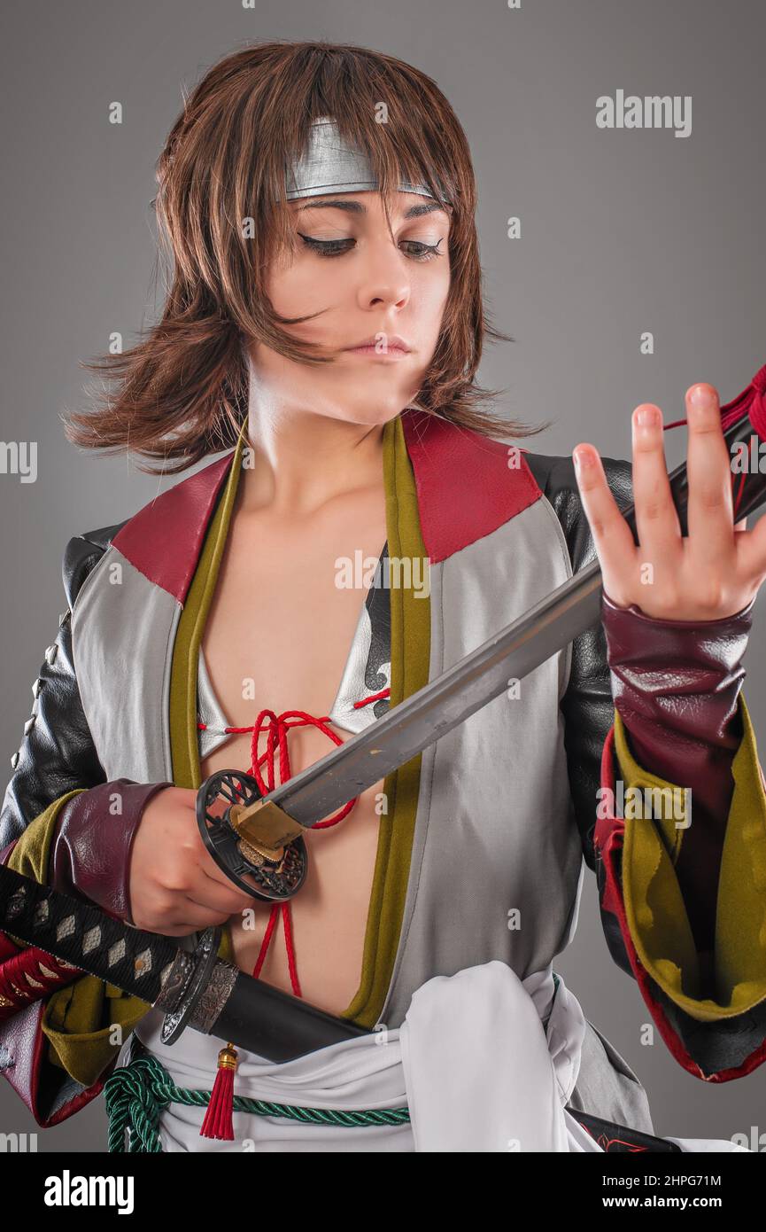 Japanese samurai with katana sword. Studio shoot. Isolated Stock Photo