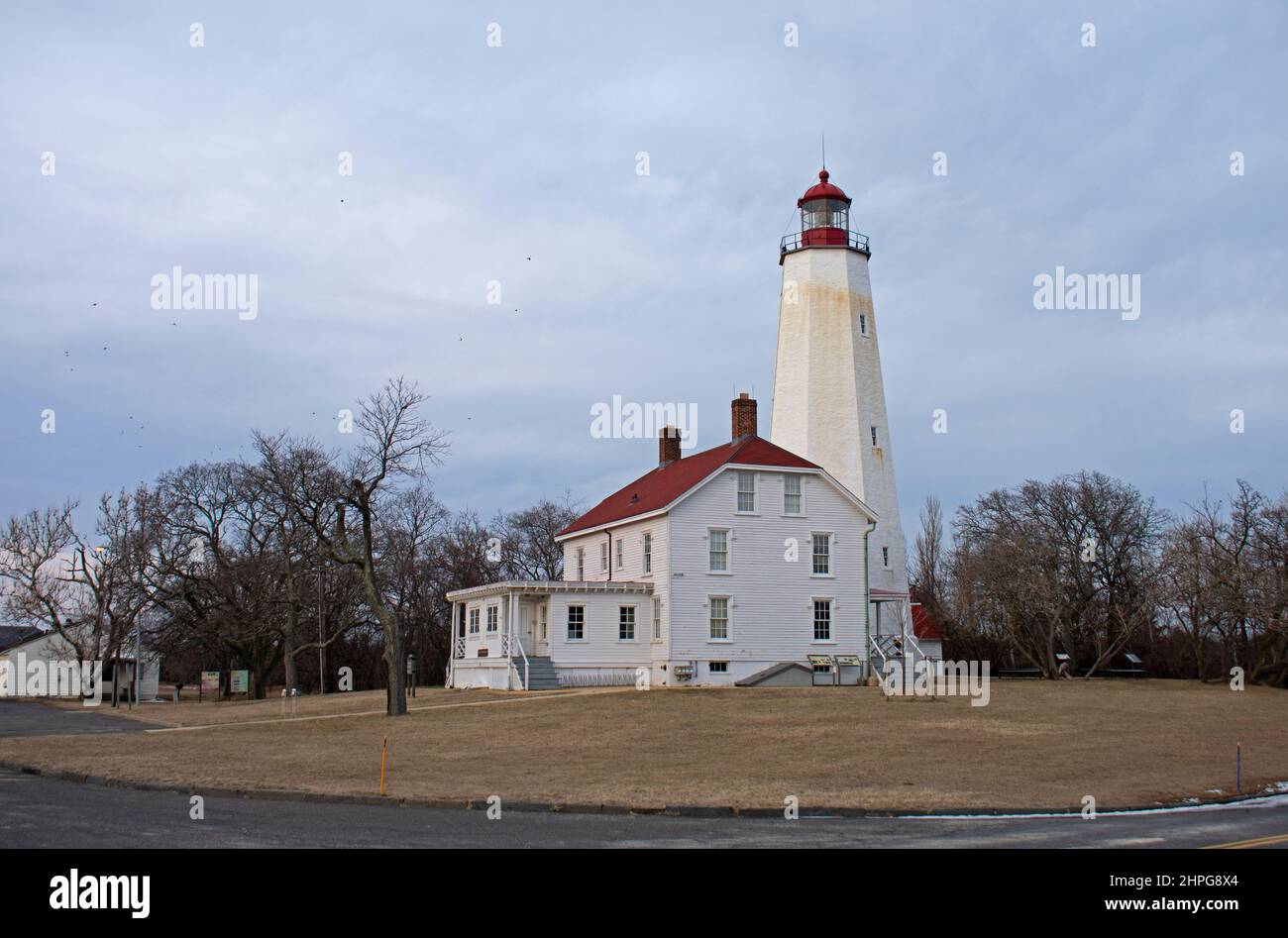 Lighthouse in Sandy Hook, New Jersey, during daylight hours in winter