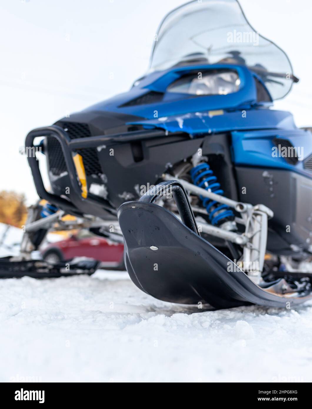Snowmobile in winter conditions. Snowmobiling in winter in the north Stock Photo