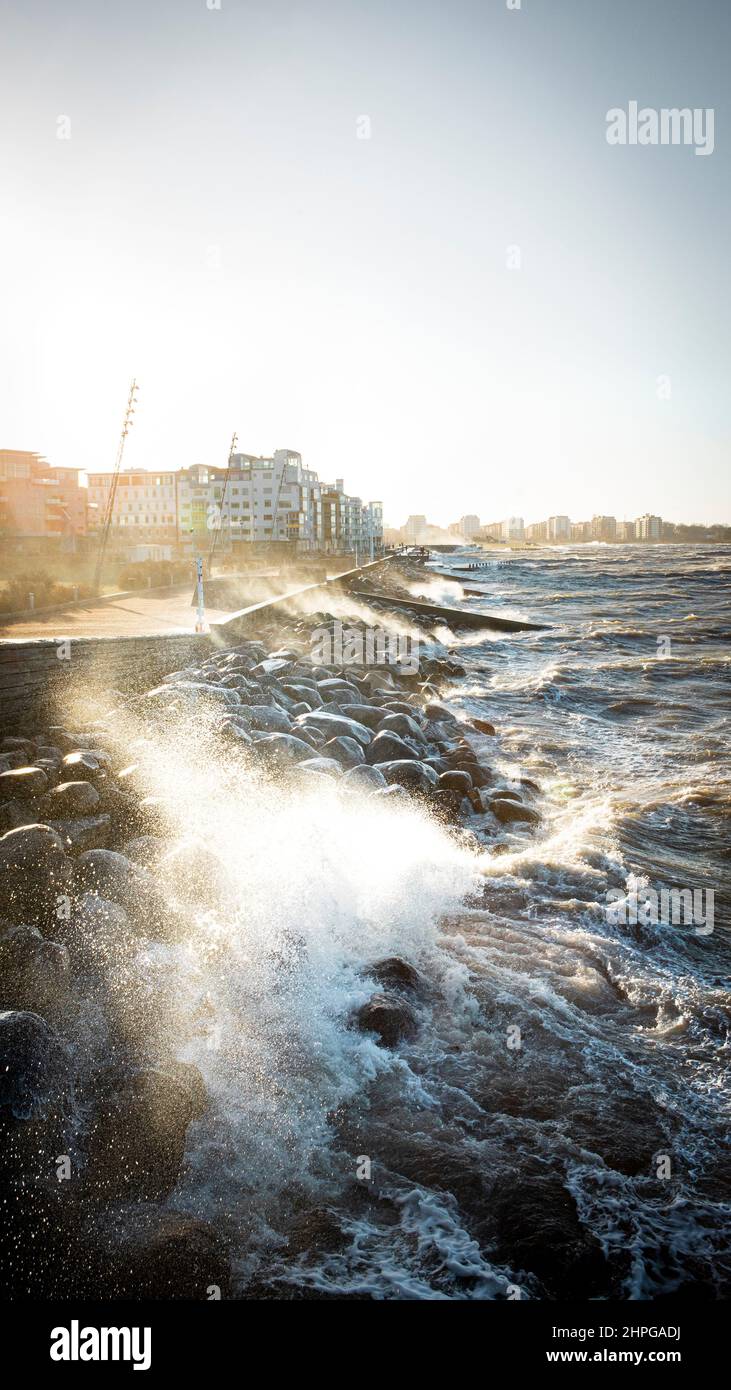 WESTERN HARBOR, MALMOE, SWEDEN - JANUARY 30, 2022: The storm named 'Malik' hits the southwest of Sweden stirring up huge waves flooding the area of We Stock Photo