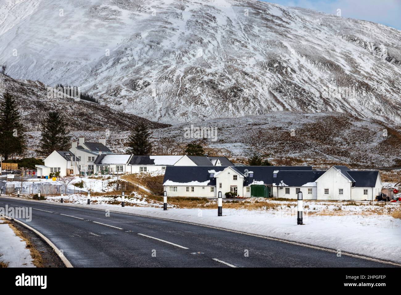 CLUANIE INN KINTAIL SCOTLAND WINTER SNOW COVERS THE HOTEL AND ROAD A87 ...