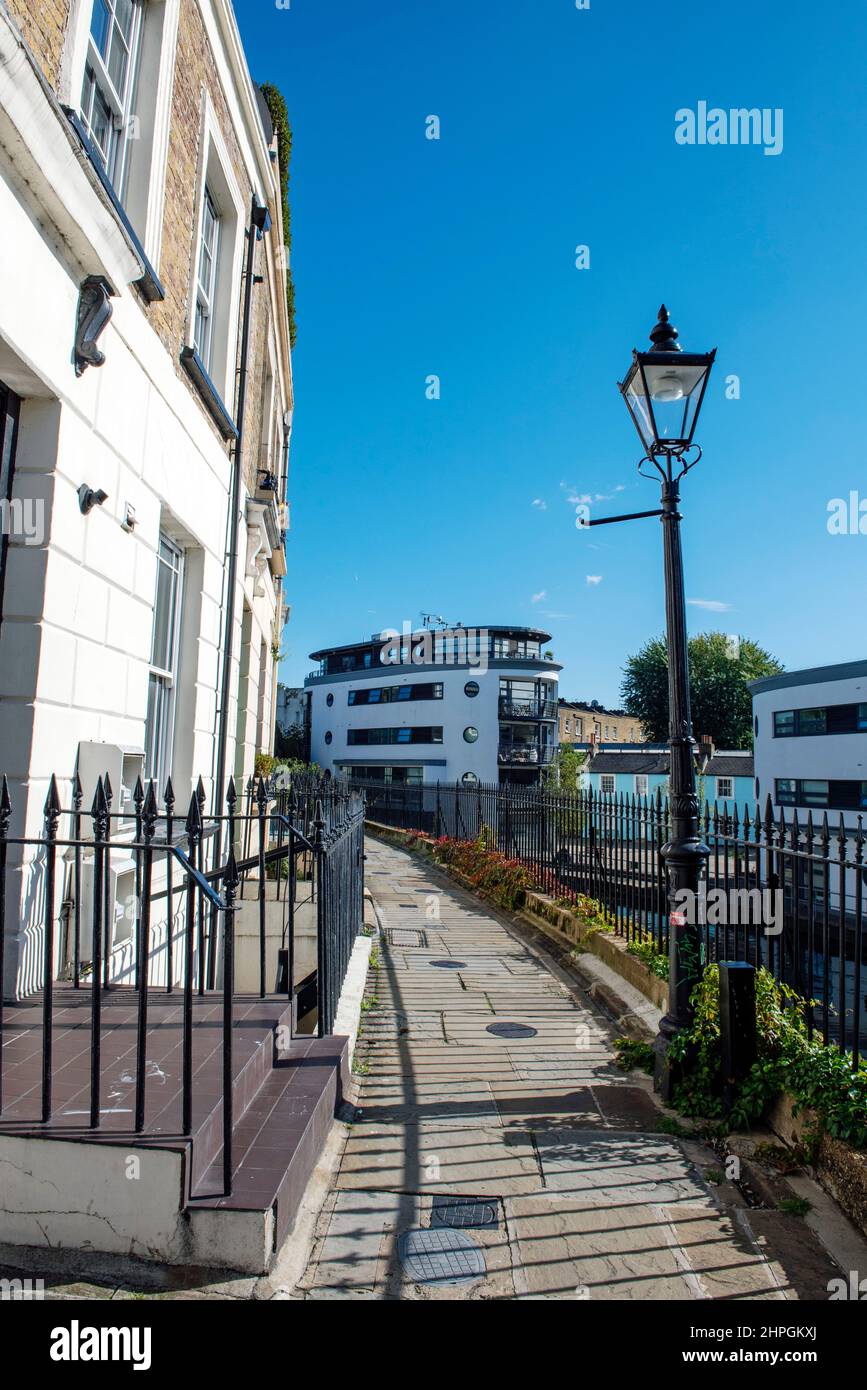 Lyme Terrace running next to the Regents Canal with Victorian street light or lamppost in view, Camden Town London. Stock Photo