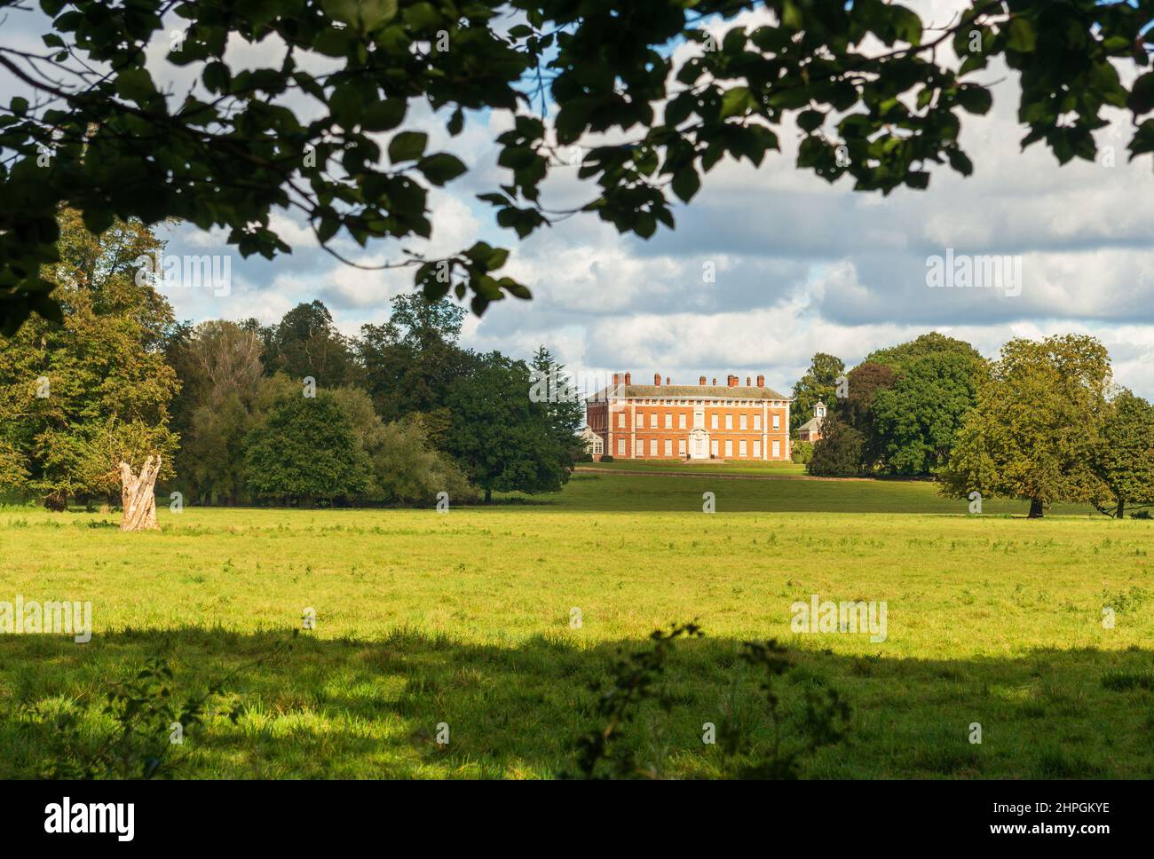 View across Beningbrough Park towards the Georgian mansion located near York in North Yorkshire Stock Photo