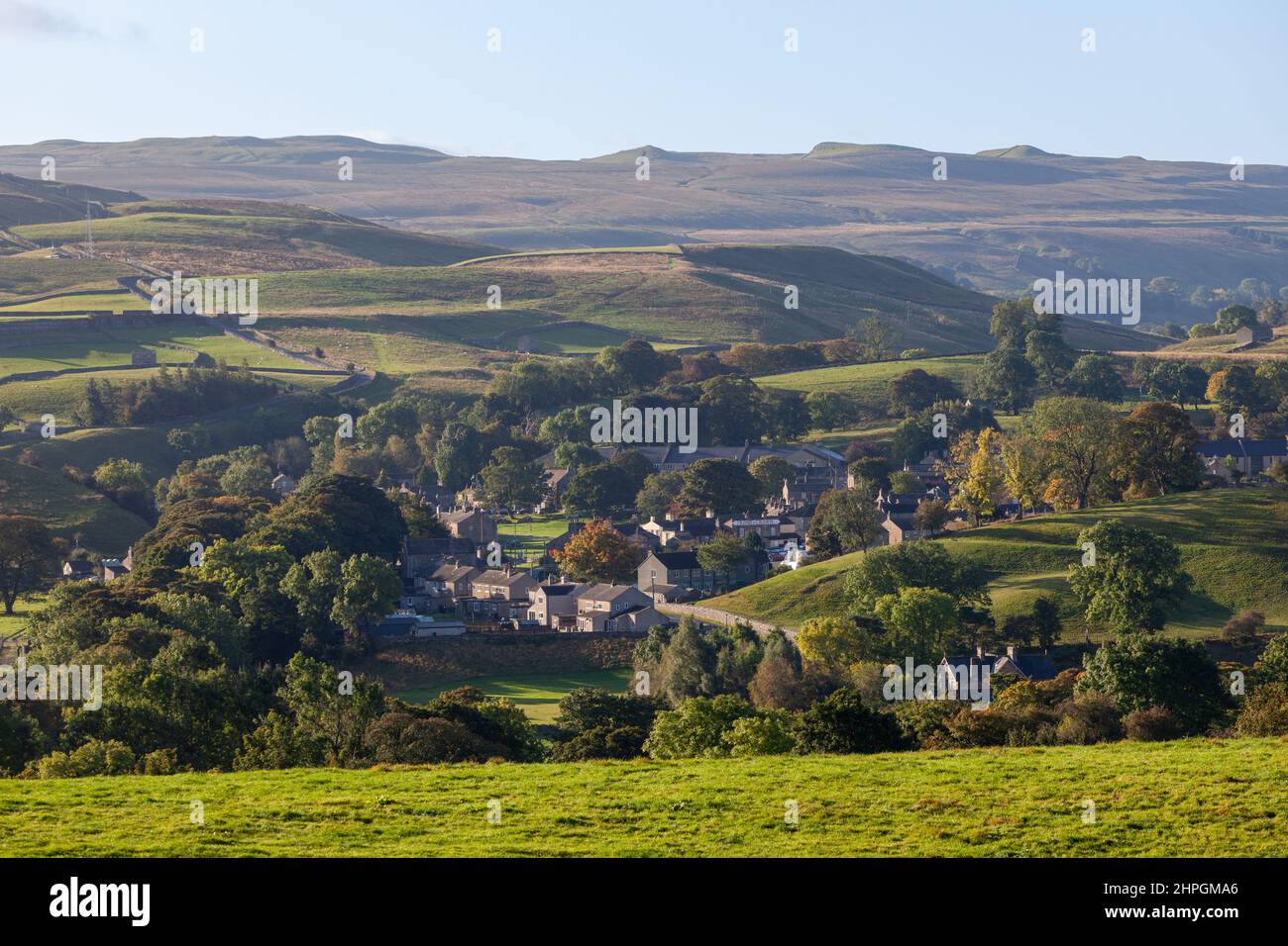 Early morning view of Bainbridge and surrounding hills from Lamb Hill near Askrigg Stock Photo