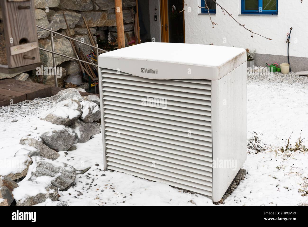 A ground source heat pump, an eco friendly choice of renewable technology, covered in snow during winter in Lower Austria, Austria Stock Photo