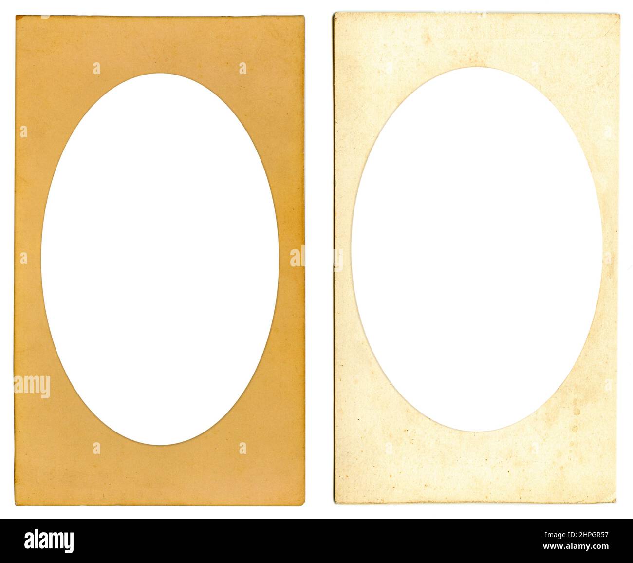 Old cardboard photo frame with ellipse vignette and empty space inside isolated on white background. Mock up Stock Photo