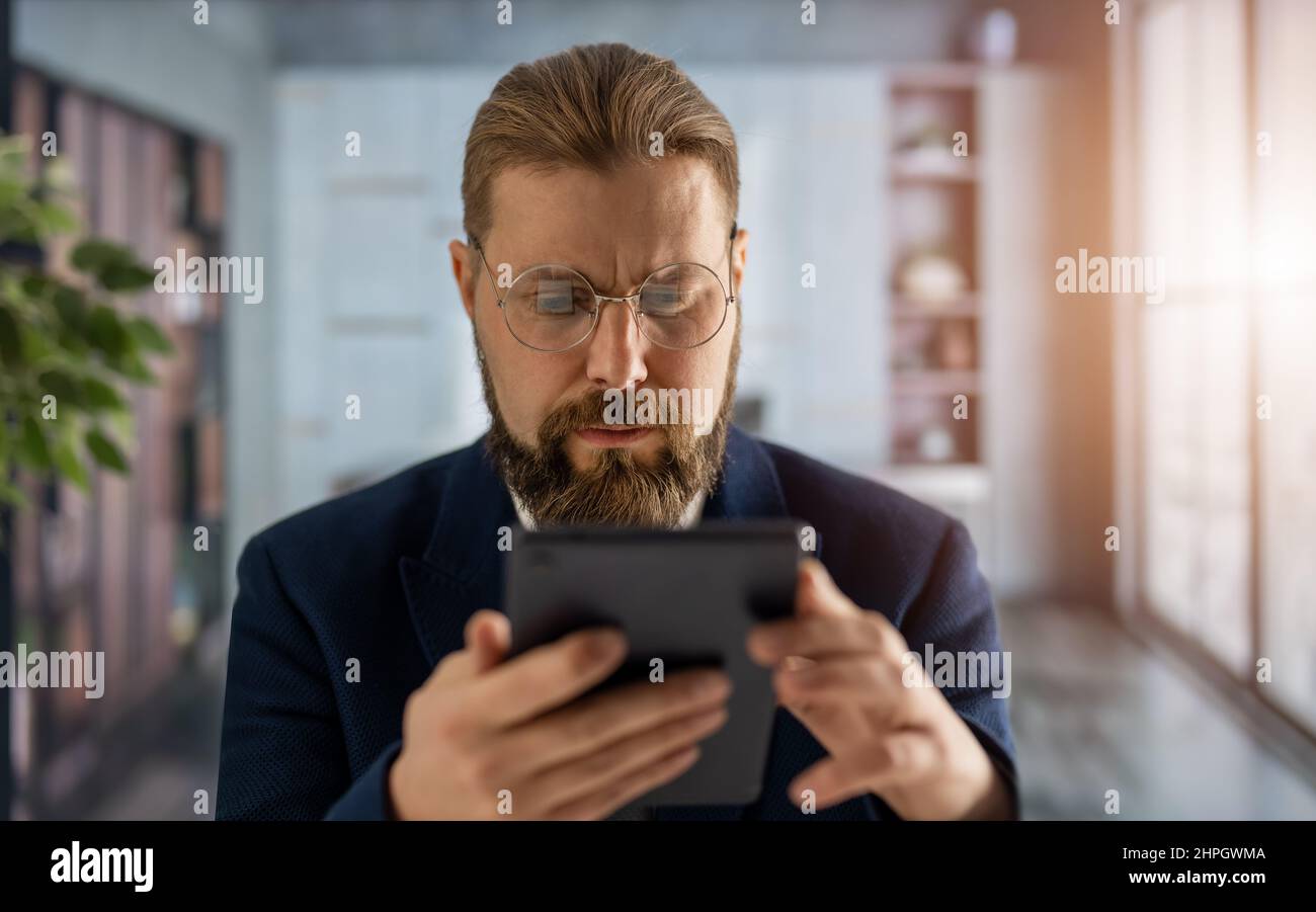 Man with tablet at office Stock Photo