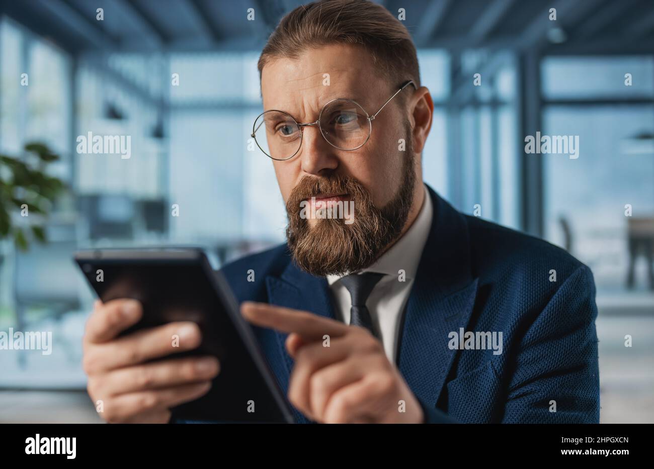 Man with tablet at office Stock Photo