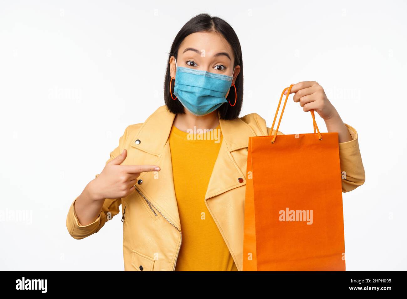 Covid19 and shop concept. Young asian stylish woman, wearing medical