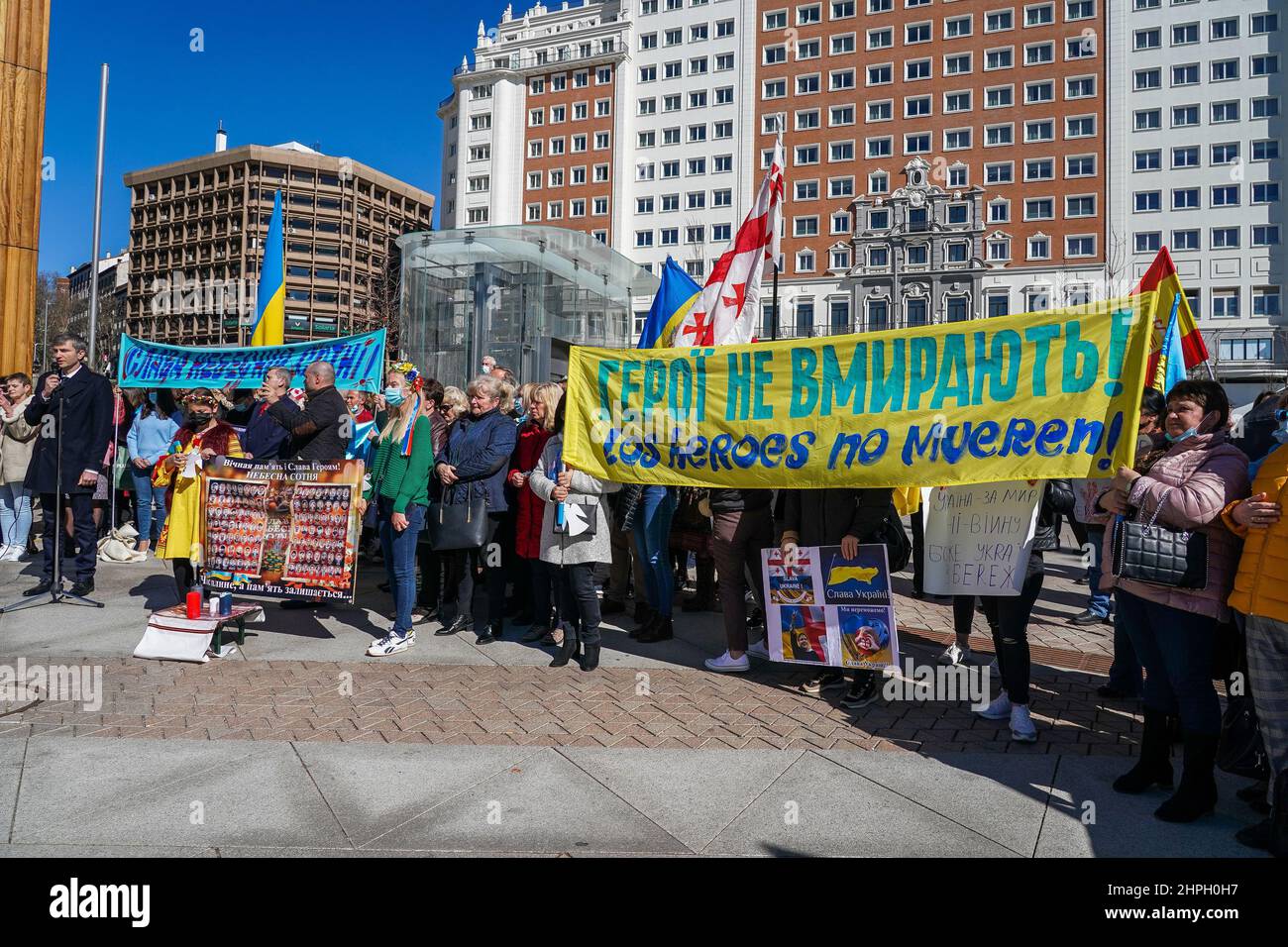 Madrid, Spain. 20th Feb, 2022. Protesters seen holding a banner saying "stop Putin" during the demonstration against Putin and the possible Russian invasion of Ukraine at Spain Square in Madrid. Credit: SOPA Images Limited/Alamy Live News Stock Photo