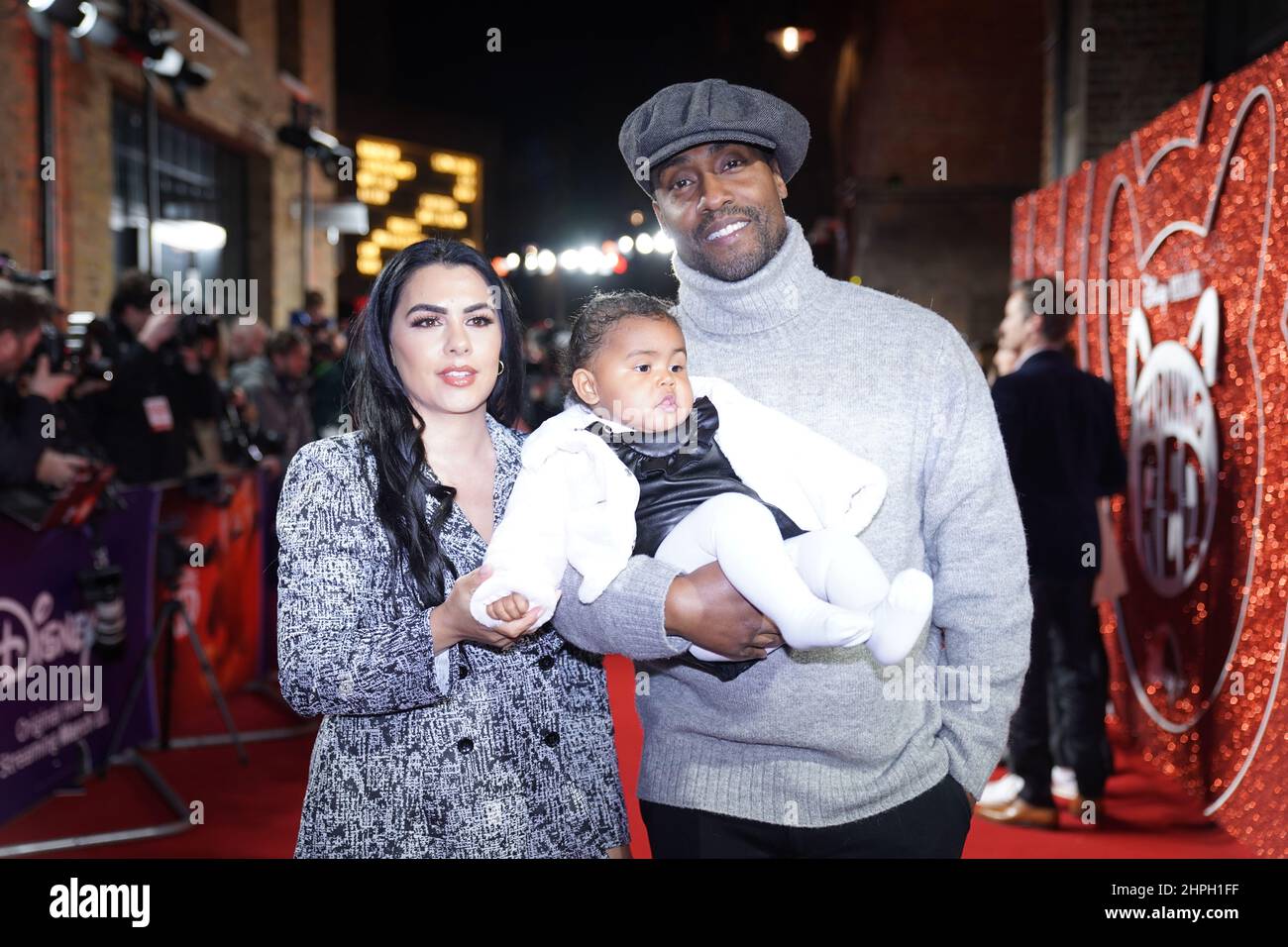 Simon Webbe, from Blue, with his partner Ayshen and daughter Cyan Shenel arriving for the gala screening of Disney's Turning Red at Everyman Borough Yards, south London. Picture date: Monday February 21, 2022. Stock Photo