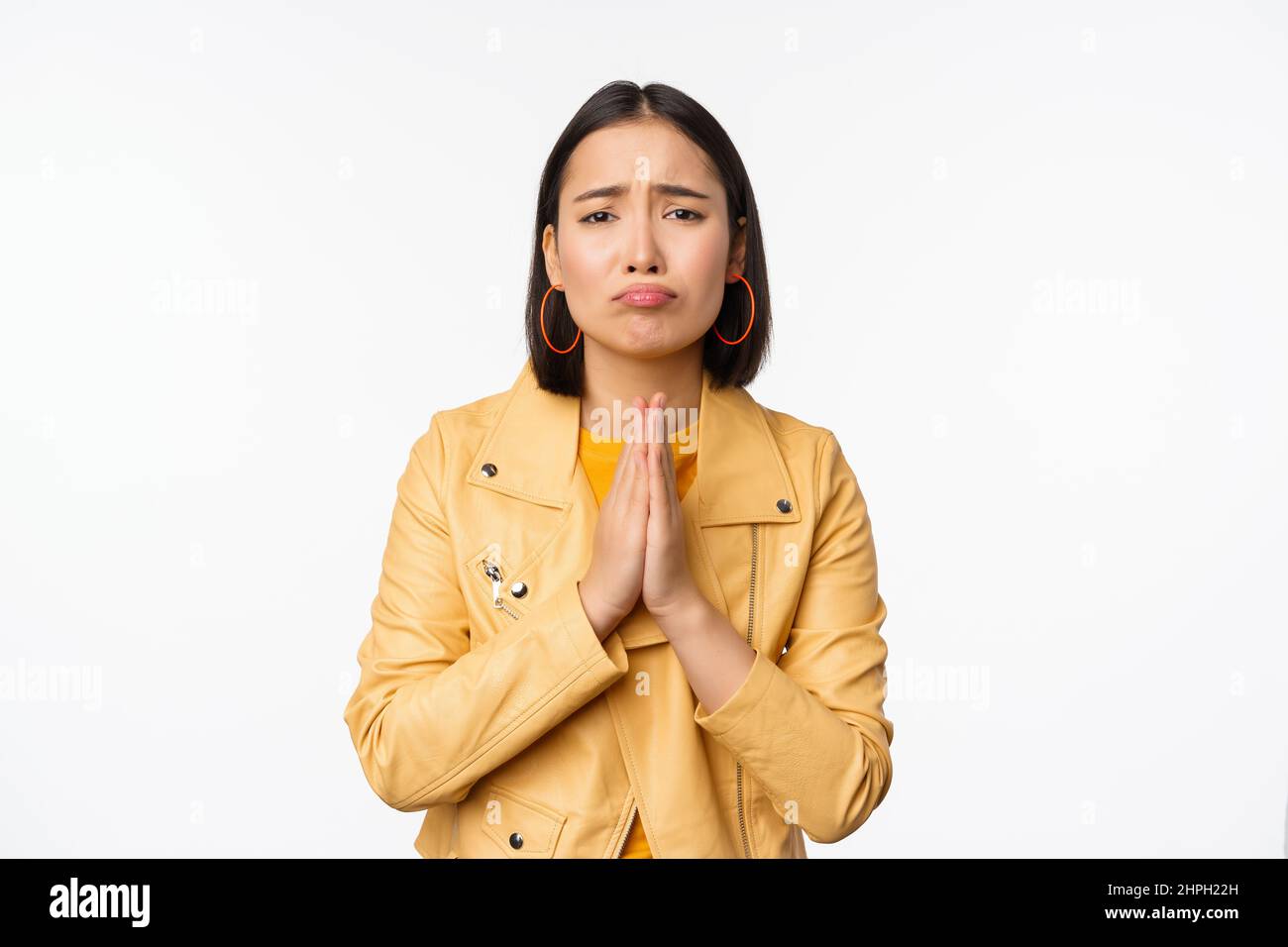 Image of hopeless asian woman begging, pleading, say sorry, looking ...