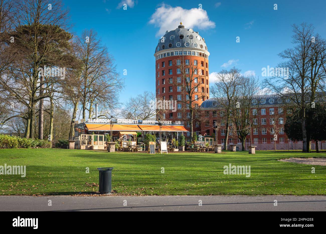 Breda, North Brabant, The Netherlands, 19.02.2022, park Valkenberg with a view of distinct high-rise residential building known as Poort van Breda Stock Photo