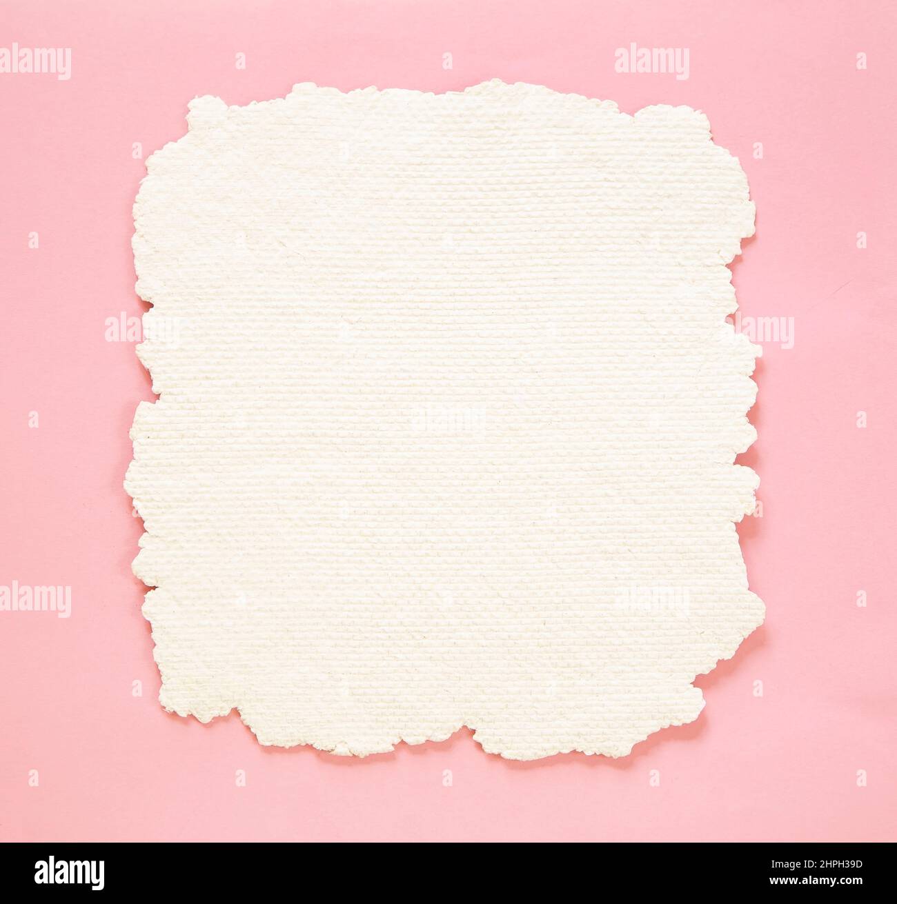 Craft paper on pink background Stock Photo