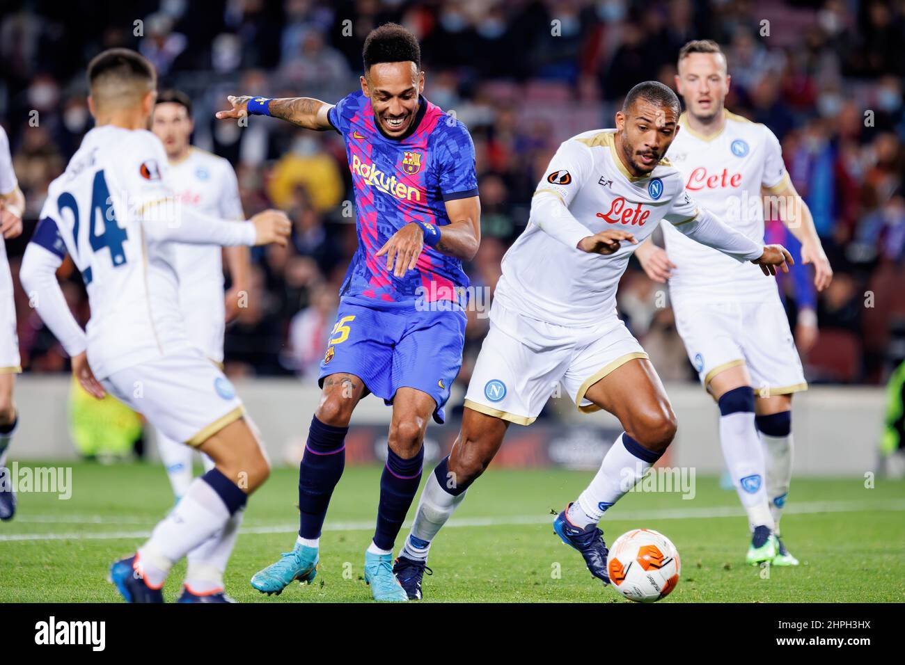 BARCELONA - FEB 17: Aubameyang (L) and Juan Jesus (R) in action during the Uefa Europa League match between FC Barcelona and SSC Napoli at the Camp No Stock Photo