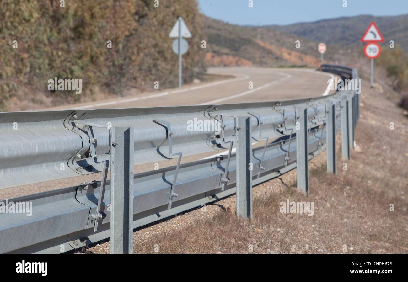 Guardrails poles covered crash-absorber beam. Roadside view. Motorists safety concept Stock Photo