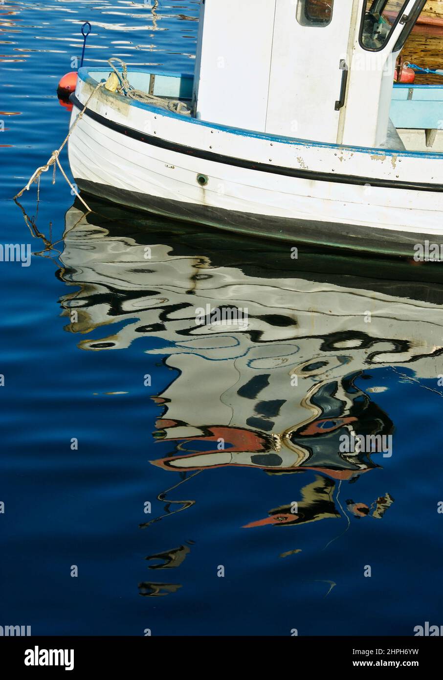Detail of industrial fishing boat and its reflection in the water Stock ...