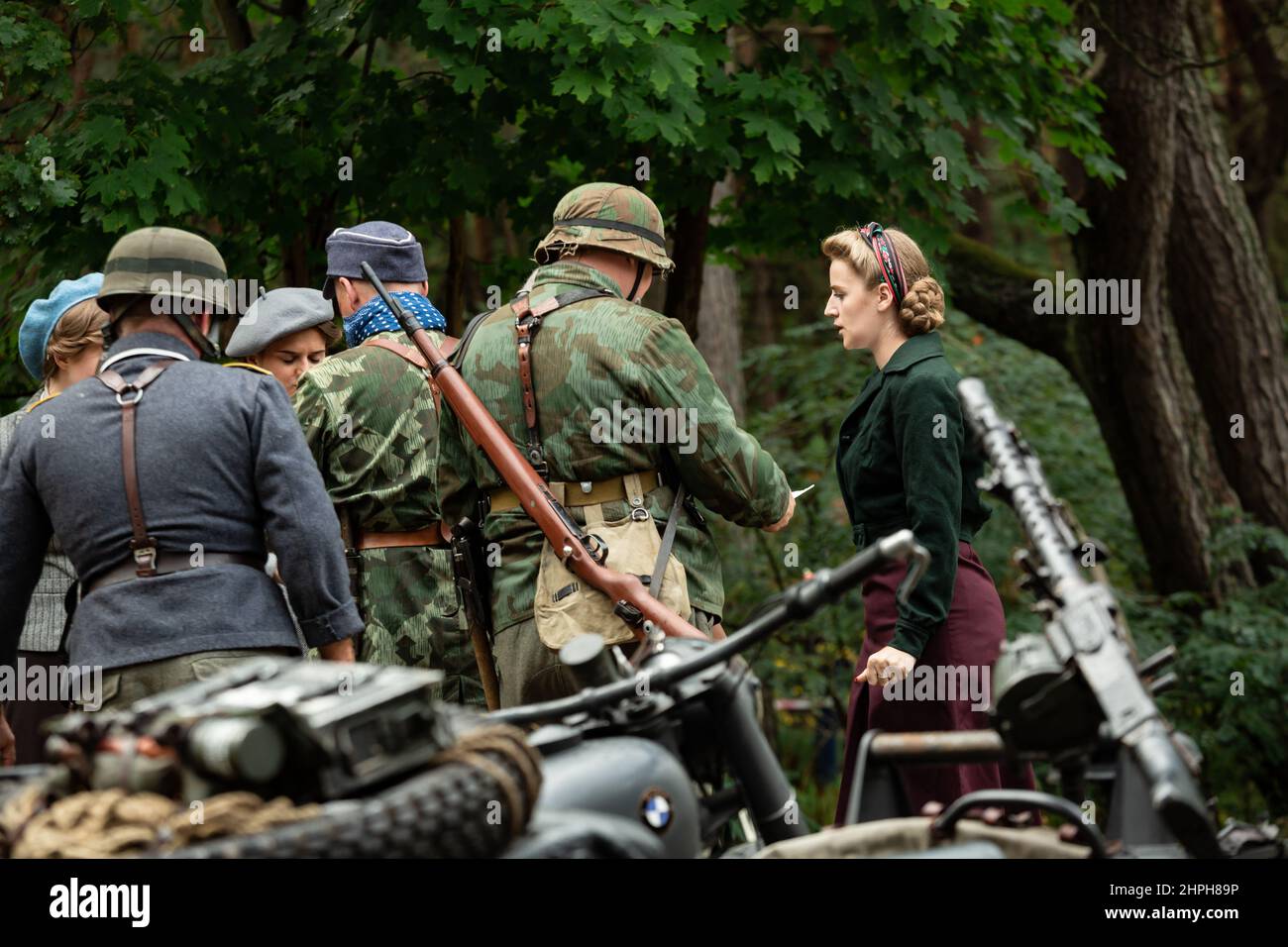Hel, Pomerania, Poland- August 27, 2021: Historical reconstruction.  Second World War. France, German occupation.  German wehrmacht soldiers checking Stock Photo