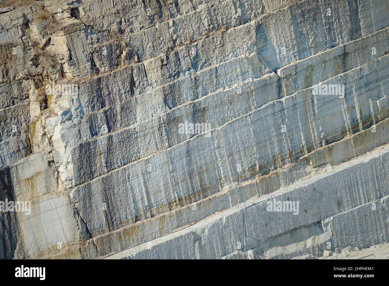 Quarry for the extraction of Luserna stone, a valuable rock that is mainly used for outdoor use in paving and cladding, balconies and stairs. Montoso, Stock Photo