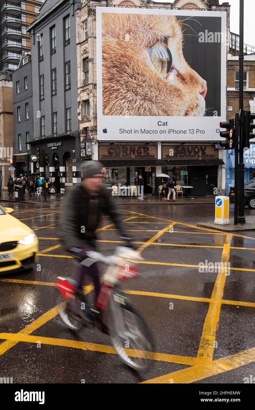 Box junction near Old Street in London UK. In the background an advert for an iPhone can be seen featuring a cat. Stock Photo