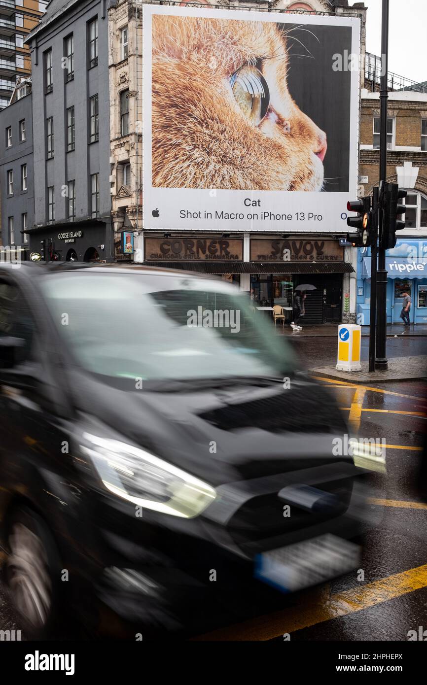 Box junction near Old Street in London UK. In the background an advert for an iPhone can be seen featuring a cat. Stock Photo