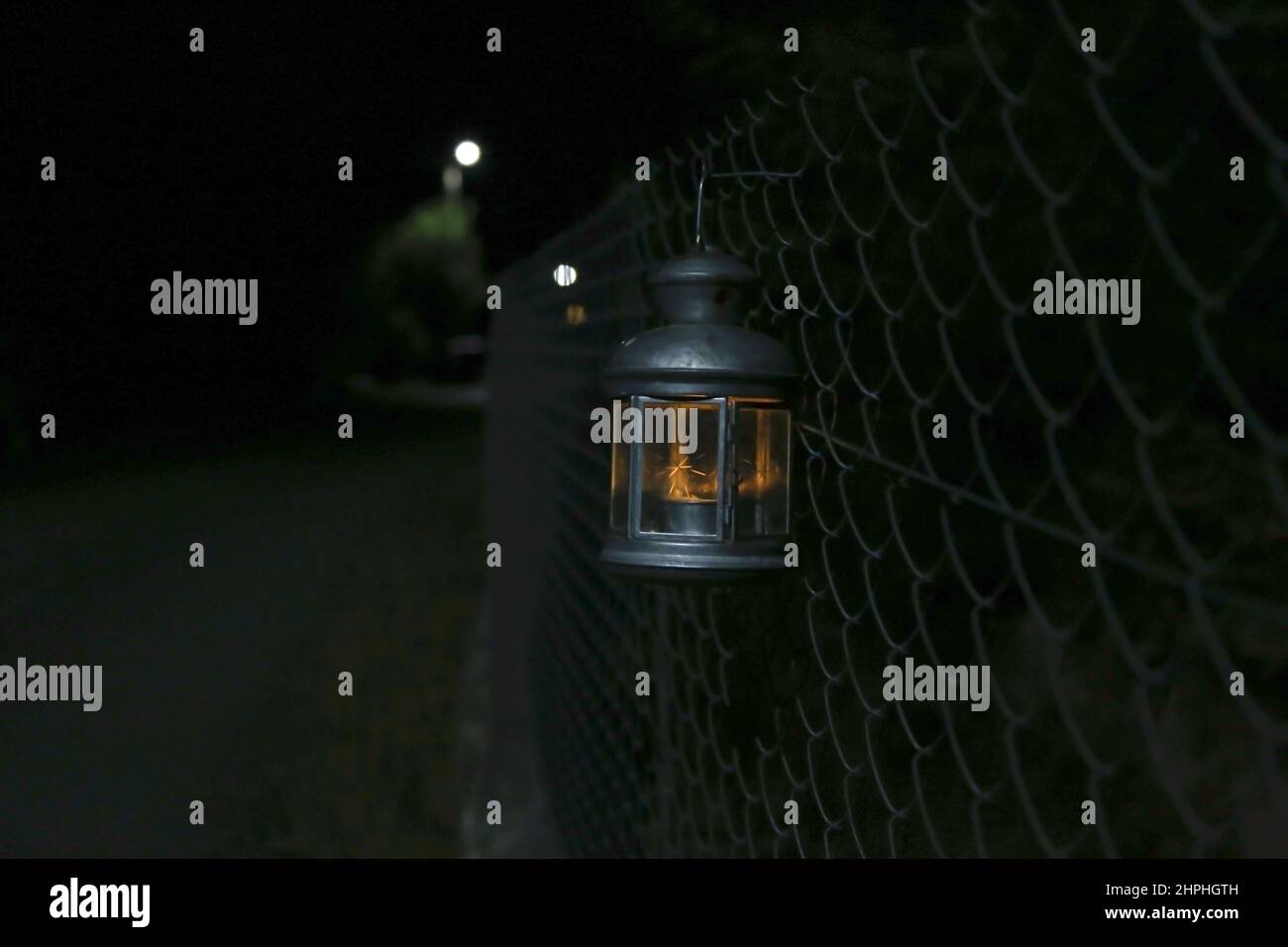 Lantern on fence hi-res stock photography and images - Alamy