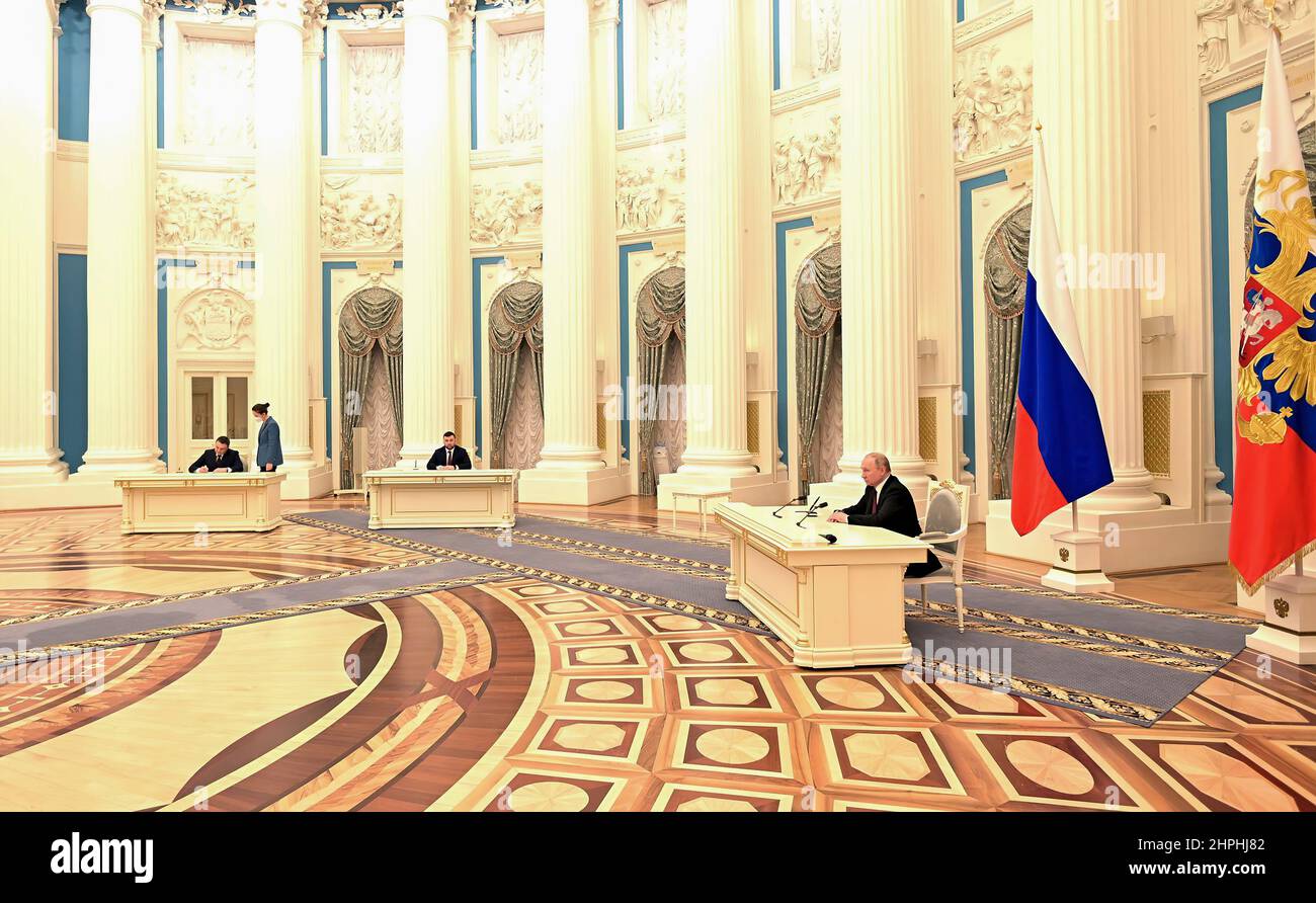Russian President Vladimir Putin signs documents recognizing Donetsk and Lugansk People’s Republics as independent states.. Donetsk and Lugansk are breakaway regions of Ukraine. Stock Photo