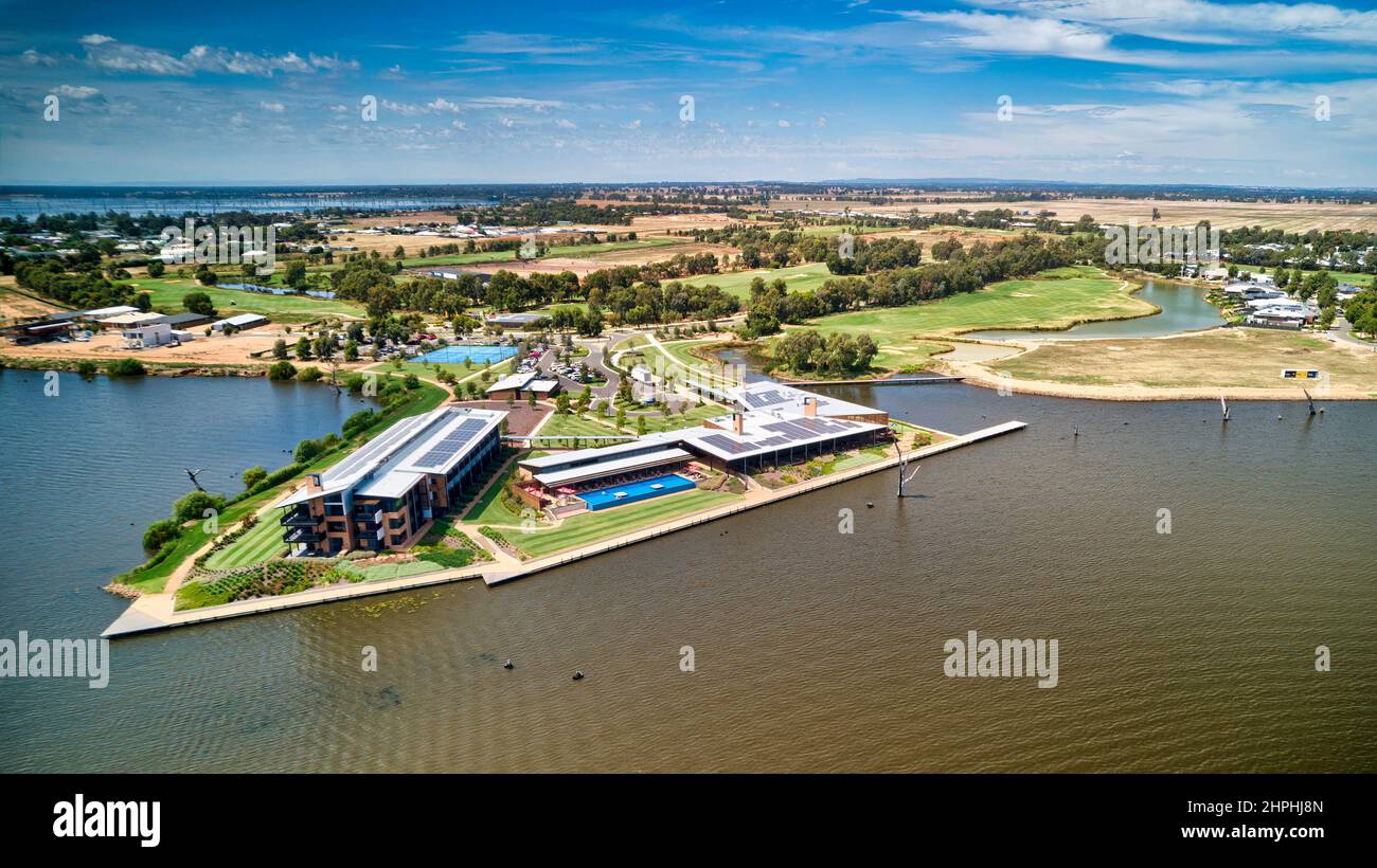 Yarrawonga, Victoria Australia - February 10 2022: Aerial view across Lake Mulwala to Yarrawonga Sebel Hotel and Black Bull Golf Course Stock Photo