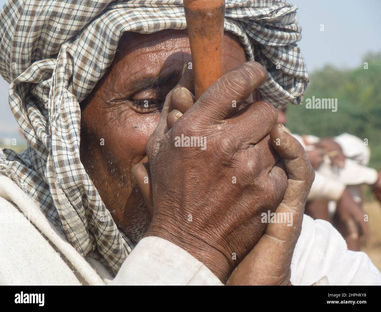 man smoking hashish in tjilm, Rajasthan, India Stock Photo